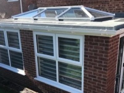 Insulated Flat Roof Orangery With Glass Lantern